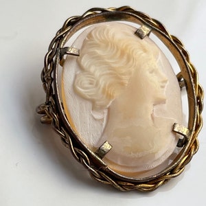 Antique carved shell lady cameo 1.25 inch x 1 inch ins size in brass frame circa 1930’s
