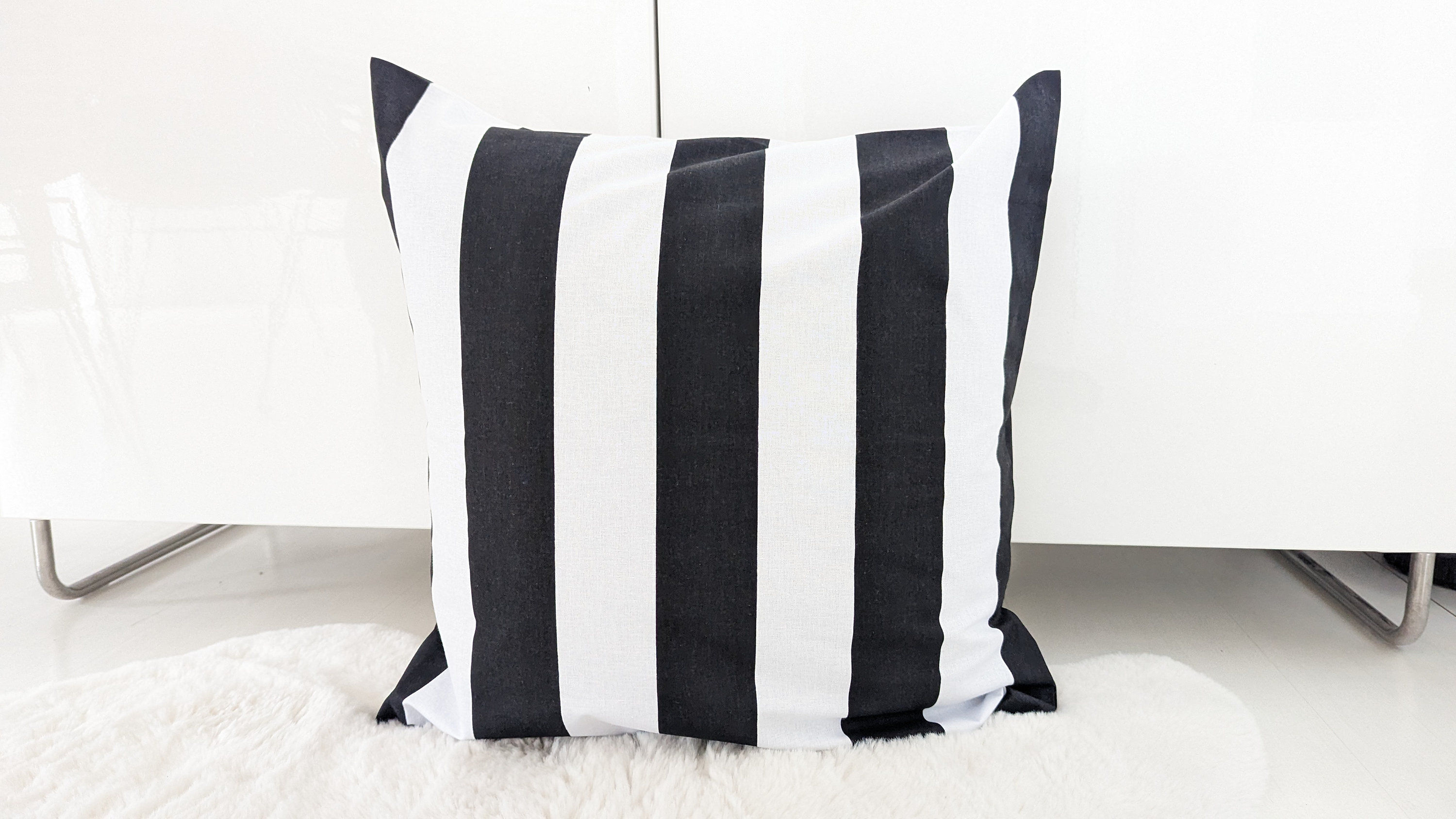 Black and white striped cushions