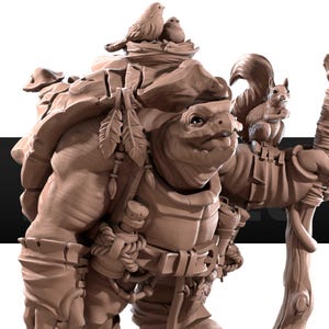 May include: A detailed sculpture of a turtle-like creature with a friendly expression. The figure is adorned with a backpack, feathers, and a squirrel perched on a staff. Two birds rest on the turtle's shell. The sculpture is a warm brown colour.