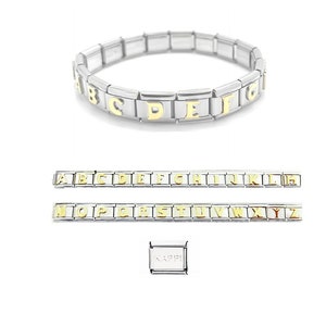 May include: A silver charm bracelet with gold alphabet charms. The bracelet is shown with a separate set of charms, including all letters of the alphabet, and a single charm with the word "KAPPi".