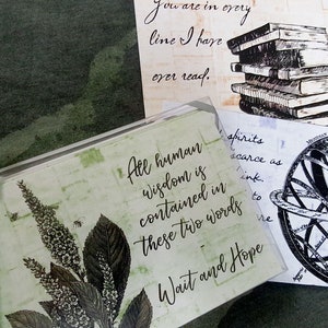 May include: A green background with three cards. The top card has a quote about reading. The middle card has a quote about human wisdom and the words "Wait and Hope". The bottom card has a quote about spirits and a black and white illustration of a celestial sphere.