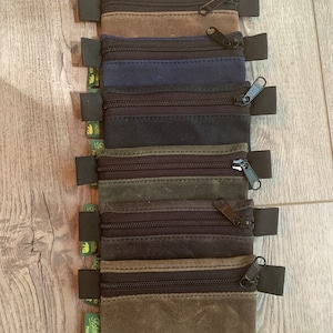 Pequeña bolsa/cartera con cremallera