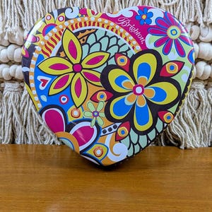 May include: A rustic wooden sign with the text "Welcome to our home" in white lettering. The sign features a distressed finish and a simple, inviting design, perfect for a front porch or entryway.