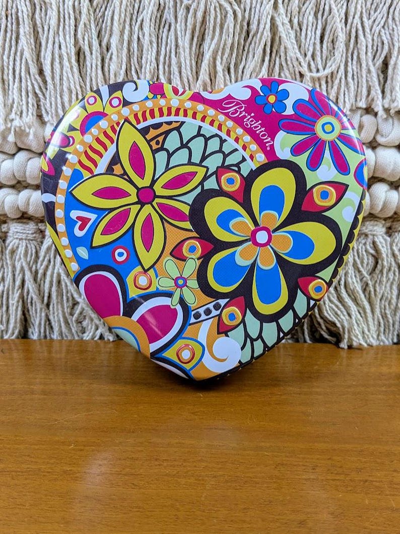 May include: A rustic wooden sign with the text "Welcome to our home" in white lettering. The sign features a distressed finish and a simple, inviting design, perfect for a front porch or entryway.