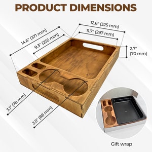 May include: Wooden serving tray with a handle and four cup holders. The tray measures 14.6 inches by 9.3 inches by 3.1 inches. The tray is made of natural wood and has a light brown color.