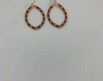 Black and orange oval hoops