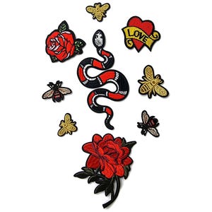 May include: A collection of embroidered patches featuring a red rose, a snake, bees, and a heart with the word "LOVE" on a banner. The patches are in various sizes and colors, suitable for clothing or accessories.