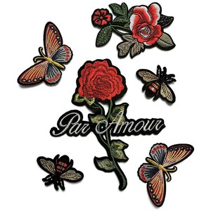 May include: Iron-on patches featuring a red rose, butterflies, bees, and the text "Par Amour".