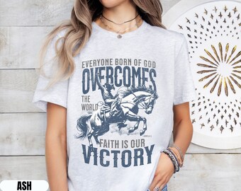 Faith Is Our Victory Shirt, 1 John 5:4-5 Cowboy Overcomer Shirt for Christian Woman, Trendy Christian Shirt, Distressed Boho Western Shirt