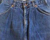 Vintage orange tab Levis, mom jeans, vintage jeans, 24 inch waist, cinch waist, 90s