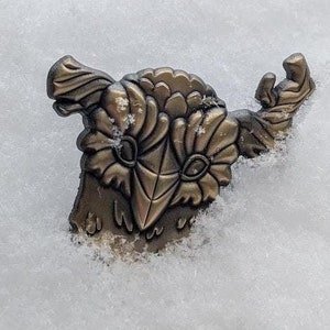 Emaille pin buitenste Wilds gevangene