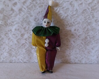small porcelain clown dolls