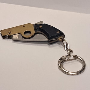 Antique  pocket knife, shotgun shape, 1940s