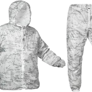 May include: A white and gray camouflage rain suit, including a hooded jacket and matching pants. The jacket has a drawstring hood and button closure. The pants have a drawstring waist. The suit is made of a lightweight, possibly waterproof material.