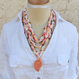 extra long and adjustable crochet necklace/belt with multi-faceted beads