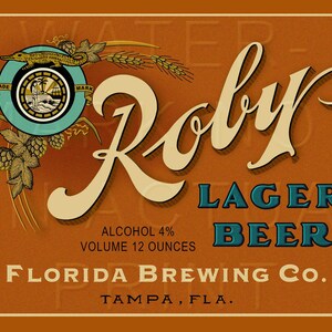 May include: A vintage-style label for Roly Lager Beer, a Florida Brewing Co. product from Tampa, Florida. The label features a stylized alligator logo, hops, wheat, and the text "TRADE MARK" in a circle. The beer is 4% alcohol by volume and comes in 12-ounce bottles.