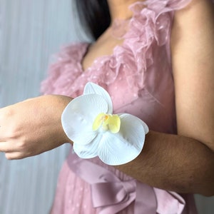White Orchid Wrist Corsage: Soft Touch Wedding Flowers