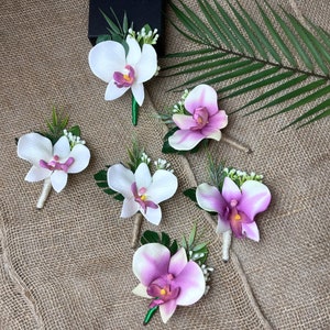 Pink orchid boutonniere, tropical monstera boutonniere, island groom boutonniere