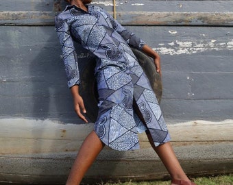 IMAN SHIRTDRESS This shirtdress in African wax print is a versatile must-have