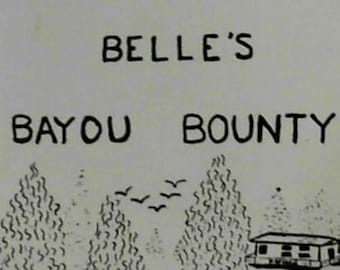 Belle's Bayou Bounty Recipes Cookbook (Firmado, 1999), Morgan City, Sur de Luisiana. Contiene numerosas recetas de camarones y mariscos, libro de bolsillo con 176 páginas.