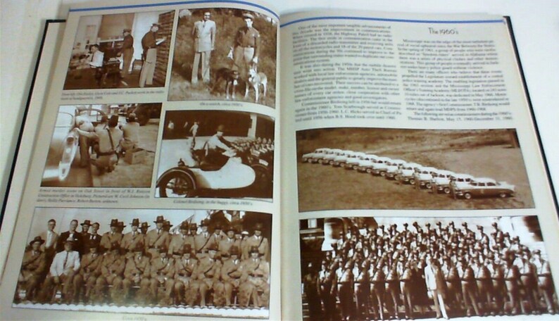 May include: A book open to a page with black and white photos of people in uniform. The text on the page reads 'The 1960s'.