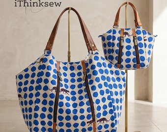 May include: Two tote bags with a white background and large blue polka dots. The bags have brown leather handles and zippers. A purple panther graphic is on the front of each bag. The text "iThinksew" is in the upper left corner.