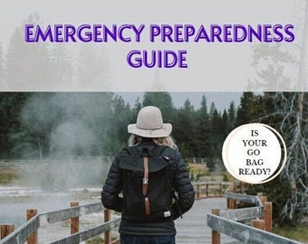 May include: A woman wearing a black jacket, jeans, and a beige hat walks on a wooden path in a forest. She is carrying a black backpack with a brown leather strap. The text "Is your go bag ready?" is written in a circle on the right side of the image.