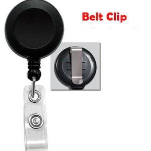 May include: Black retractable badge reel with a clear plastic badge holder and a belt clip. The reel has a black plastic casing and a silver metal clip.