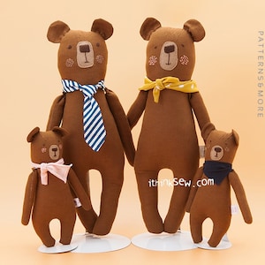 May include: Four brown plush teddy bears with embroidered faces. The largest bear is wearing a blue and white striped tie. The other three bears are wearing colorful scarves. The bears are standing on white bases. The image includes the text "ithinksew.com" and "ithinksew PATTERNS & MORE".