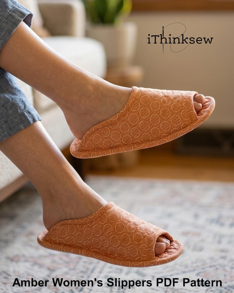 Person wearing burnt orange patterned open toe fabric slippers standing on a rug. Womens slipper sewing pattern PDF design named Amber Women's Slippers perfect for DIY house shoes.