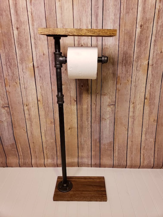 toilet paper holder height on cabinet