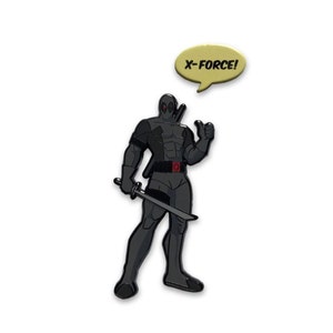 May include: A black and grey Deadpool figure with a sword and thumbs up gesture. A yellow speech bubble above the figure reads "X-FORCE!". The figure has a red belt buckle and is on a white background.