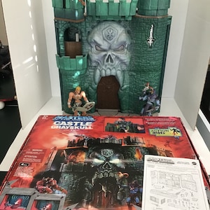 MOTU Castle Grayskull with He-man and Skeletor Action Figures