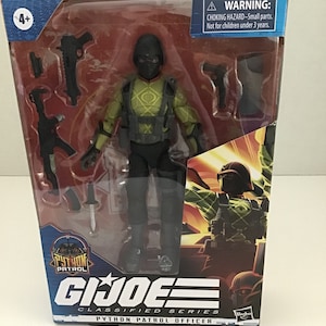 May include: A G.I. Joe Classified Series action figure of a Python Patrol Officer. The figure is wearing a black and yellow uniform with a black mask. The figure comes with several accessories, including a gun, a knife, and a backpack. The packaging features the G.I. Joe logo and the words "Classified Series" and "Python Patrol Officer".