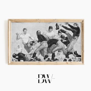 May include: A black and white framed illustration of a football game in progress. The players are wearing helmets and uniforms. The image is set against a light background.