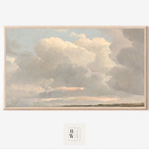 May include: A framed painting of a cloudy sky with a hint of pink in the distance. The clouds are a soft gray and white, and the sky is a light blue.