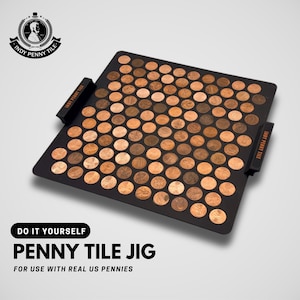 May include: A black penny tile jig with a grid of US pennies. The jig has two black handles with the text "INDY PENNY TILE". The text "DO IT YOURSELF PENNY TILE JIG FOR USE WITH REAL US PENNIES" is also visible.