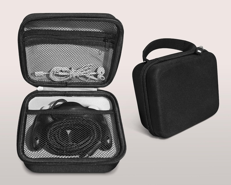 May include: Black zippered carrying case, open to reveal headphones and cables. The case has a mesh pocket on the top and a handle on the side. A second, closed black case is also shown.
