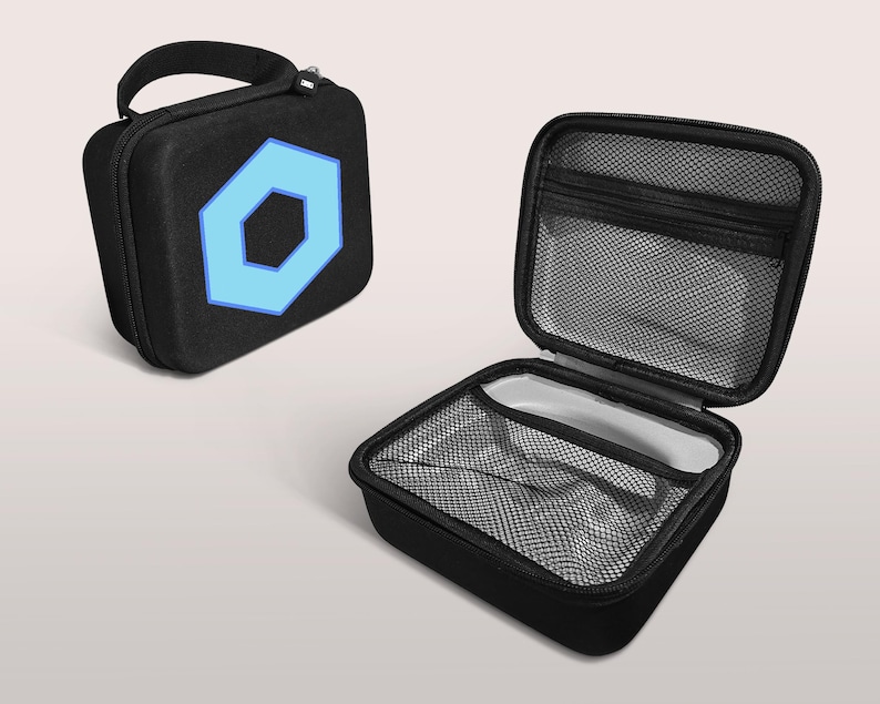 May include: Black, square, zippered carrying case with a light blue hexagon design. The case has a handle and a mesh interior. One case is open, revealing the interior mesh and a small compartment.