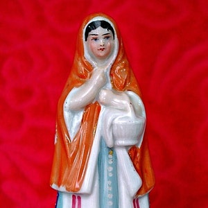 Antique Porcelain Figurine