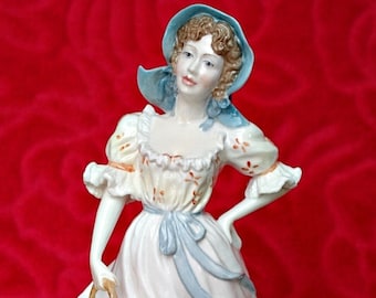 ヴィンテージ ロイヤルウースター磁器製フィギュア：チューリップを