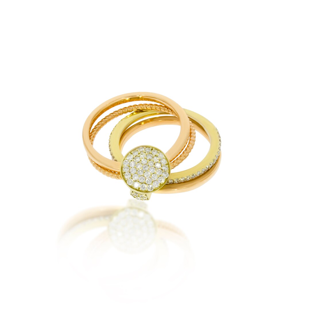 A Collection of 4 Rings, 18k Gold Rings Connected, One in a Wavy ...