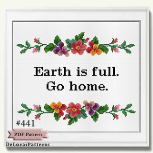 May include: A framed cross-stitch pattern with the text "Earth is full. Go home." The design features floral borders in red, orange, purple, and pink. The pattern is labeled "#441 PDF Pattern" and includes the designer's name.