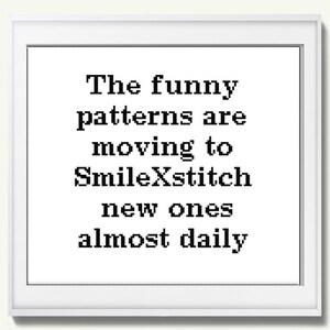 May include: A framed print with the text "The funny patterns are moving to SmileXstitch new ones almost daily" in black pixelated font on a white background. The frame is white.