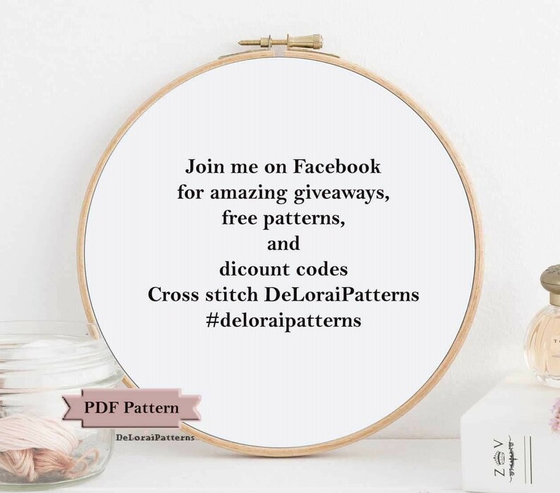 May include: A white embroidery hoop with black text that reads "Join me on Facebook for amazing giveaways, free patterns, and discount codes Cross stitch DeLoraiPatterns #deloraipatterns" and a pink ribbon with the text "PDF Pattern DeLoraiPatterns".