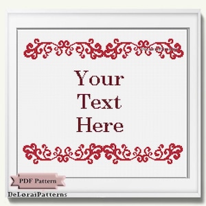 May include: Cross-stitch design with a white background, framed in white. The design features red decorative scrollwork at the top and bottom, with the words "Your Text Here" in a serif font. The words "PDF Pattern" and "DeLoraiPatterns" are also visible.