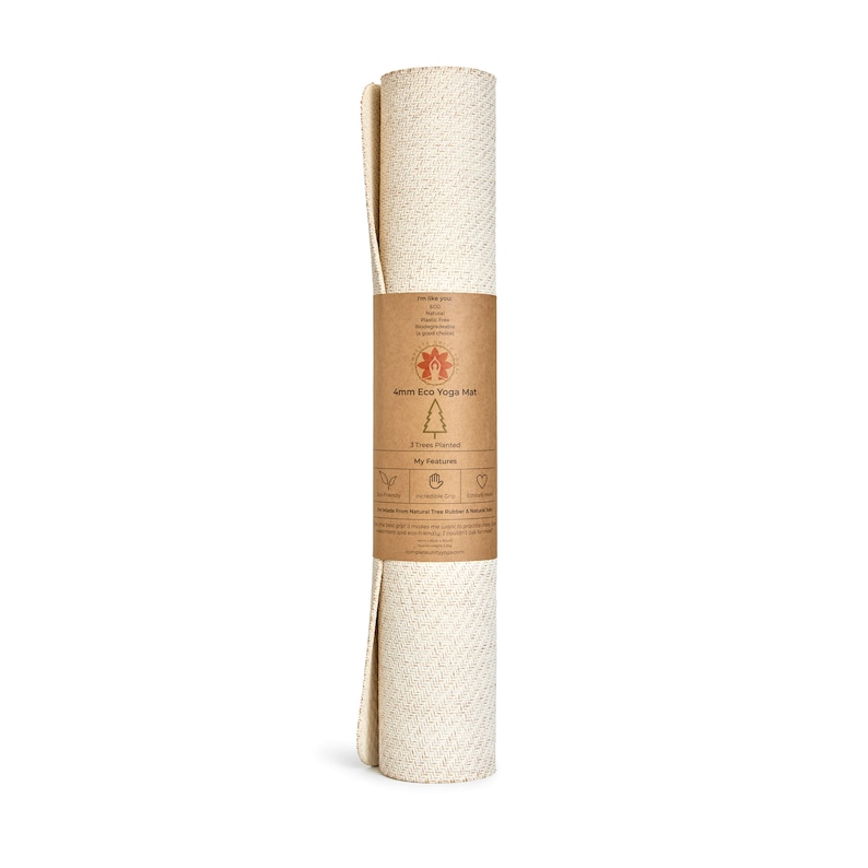 May include: Rolled up natural beige yoga mat made from tree rubber. The mat is 4mm thick and has a label that says "4mm Eco Yoga Mat" and "My Planet".