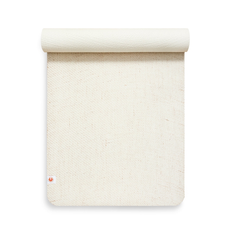 May include: A rolled up off-white yoga mat with a small orange logo in the bottom left corner.