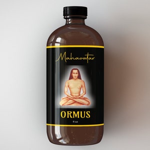 May include: A brown glass bottle with a black label. The label features a picture of a man in a meditative pose and the text "Mahavatar ORMUS fl oz".