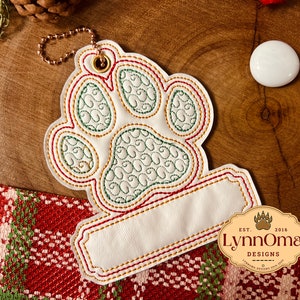 Digital File ~ Embroidered Paw Ornament With Blank Bottom For Your Pet's Name Design for Machine Embroidery. 4x4 Hoop. LynnOma Designs